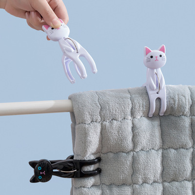 Set x2 Pinzas Multifuncionales Sit Down Gatito